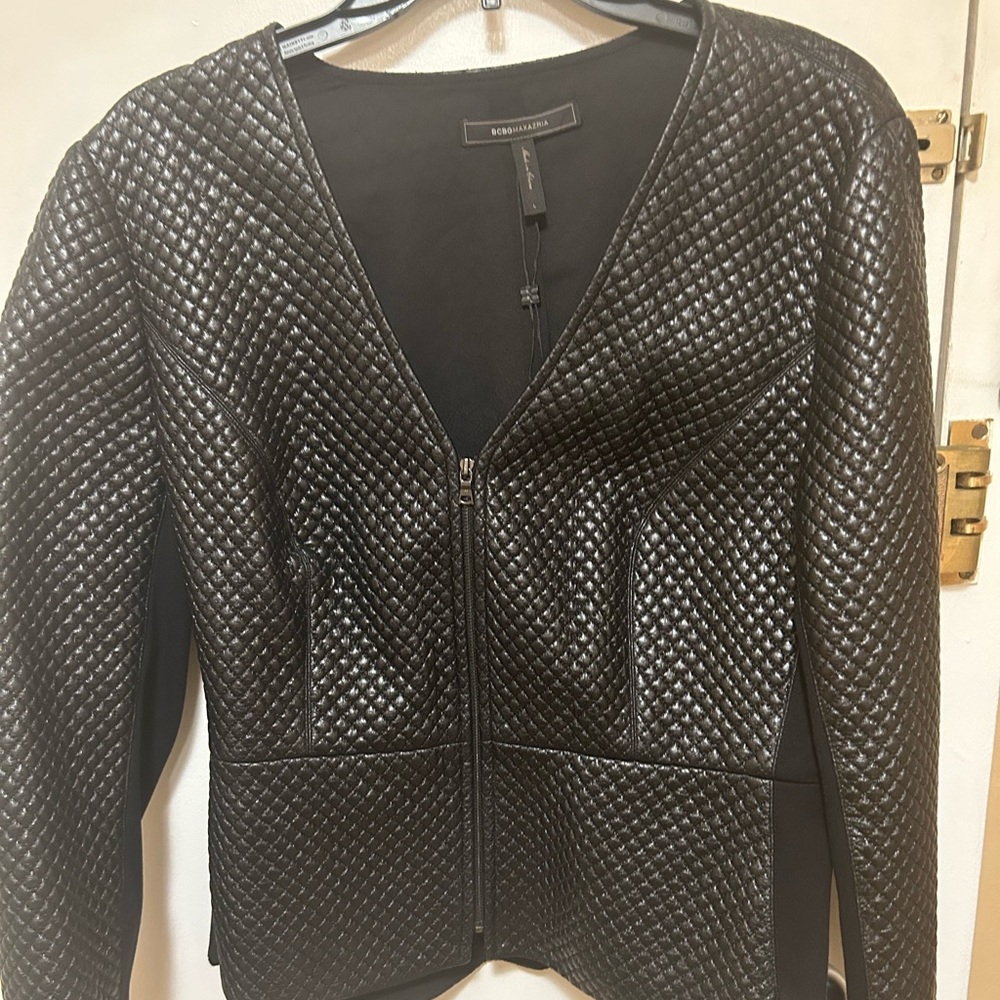 Bcbg faux leather peplum style jacket blazer.